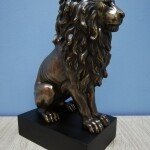 PR Lion Sitting on Base Statue