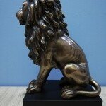 PR Lion Sitting on Base Statue