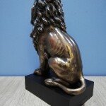 PR Lion Sitting on Base Statue
